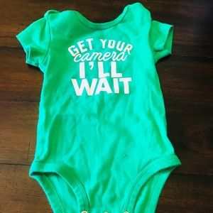 “Get you’re camera I’ll wait!” Green onsies